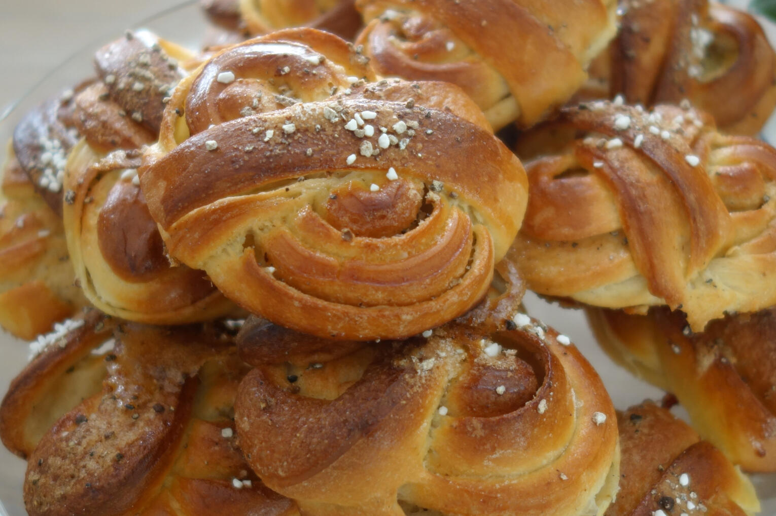 Cardamom Buns Soft enriched bun dough leavened overnight and filled and topped with cardamom and vanilla.