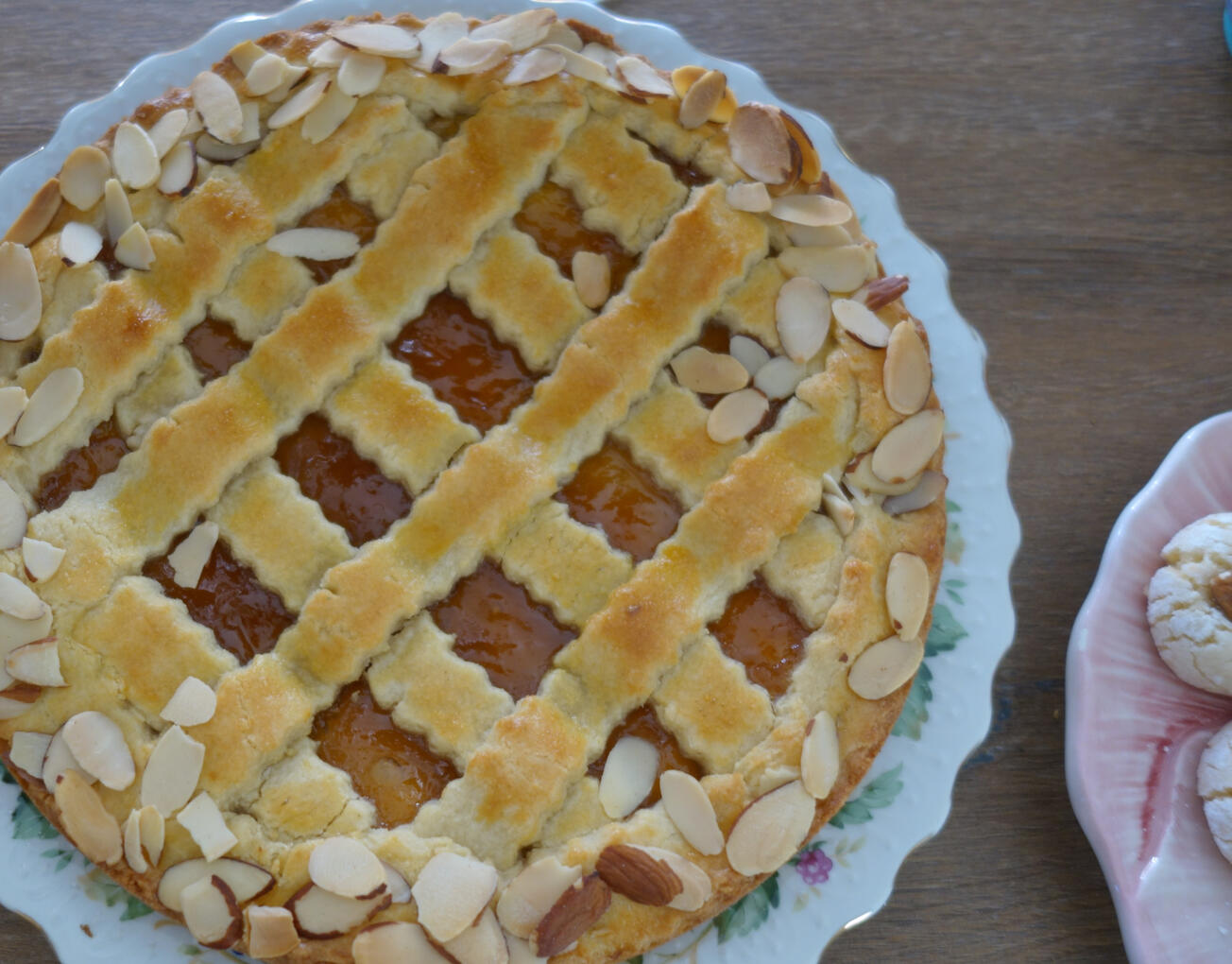 Apricot Almond Jam Tarts Almond tart crust filled with apricot jam and sprinkled with sliced almonds.